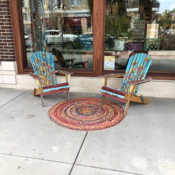 Spirited Boutiques - Fun outside area featuring hand painted chairs by Spirit. - Women's Clothing Near Me - Alpharetta, Georgia Spirited Boutiques - Fun outside area featuring hand painted chairs by Spirit. - Women's Clothing Near Me - Alpharetta, Georgia