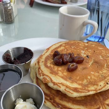 Shields Date Garden - Banana date Pancakes with butter syrup and date butter on the side- - Fruits & Veggies Near Me - Indio, California Shields Date Garden - Banana date Pancakes with butter syrup and date butter on the side- - Fruits & Veggies Near Me - Indio, California
