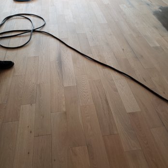 Sequoia Flooring - During: sanding with refinishing patch test, top right - Flooring Near Me - Van Nuys, California Sequoia Flooring - During: sanding with refinishing patch test, top right - Flooring Near Me - Van Nuys, California