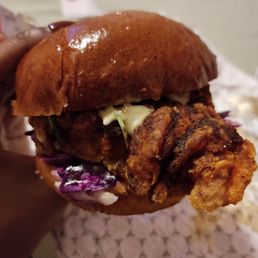 This picture is deceiving the sandwich is actually bigger than how it looks this is the Nashville fried chicken sandwich This picture is deceiving the sandwich is actually bigger than how it looks this is the Nashville fried chicken sandwich