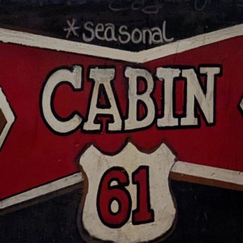 Cabin 61 - a red and white sign on a black wall - Burgers Near Me - White Bear Lake, Minnesota