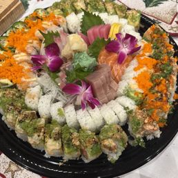 Sushi platter for Christmas gathering. Fed 5 people well with some leftover. $6 extra for togo platter. Sushi platter for Christmas gathering. Fed 5 people well with some leftover. $6 extra for togo platter.