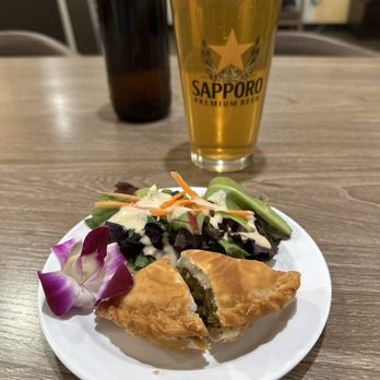 AM Noodle - a plate of food and a glass of beer - Thai Near Me - Ventura, California AM Noodle - a plate of food and a glass of beer - Thai Near Me - Ventura, California