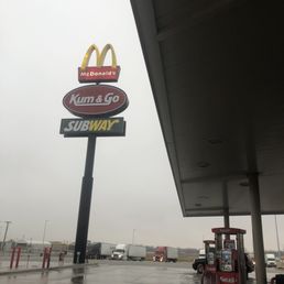a sign for a fast food restaurant a sign for a fast food restaurant