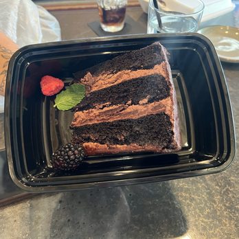 Proximo - Chocolate Cake to-go (with no chocolate sauce) - Spanish Near Me - Fort Wayne, Indiana