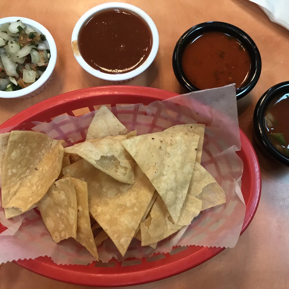 Chips and salsa (left to right: pick de gallo, mild, picante, and medium) Chips and salsa (left to right: pick de gallo, mild, picante, and medium)