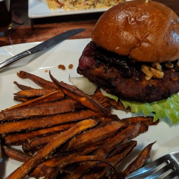 Emprize Brew Mill - Best black bean burger ever (and it is vegan!). Risotto & chicken in background. - Brewpubs Near Me - Menasha, Wisconsin