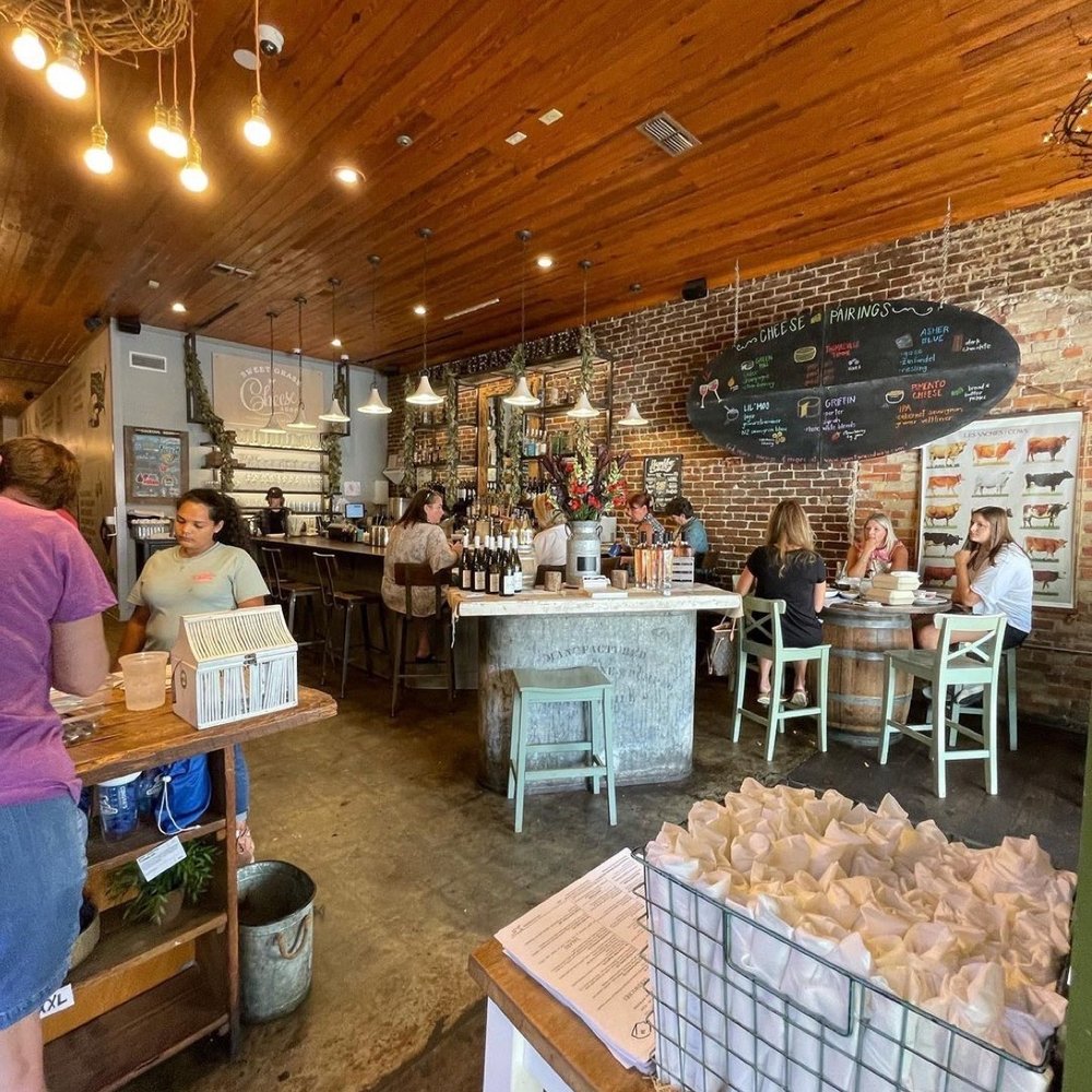 Sweet Grass Dairy - customers at the counter - Cheese Shops Near Me - Thomasville, Georgia
