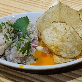 Odd Duck - gulf seafood ceviche with carrot leche de tigre, apple, radish, and potato chips - American Near Me - Austin, Texas Odd Duck - gulf seafood ceviche with carrot leche de tigre, apple, radish, and potato chips - American Near Me - Austin, Texas