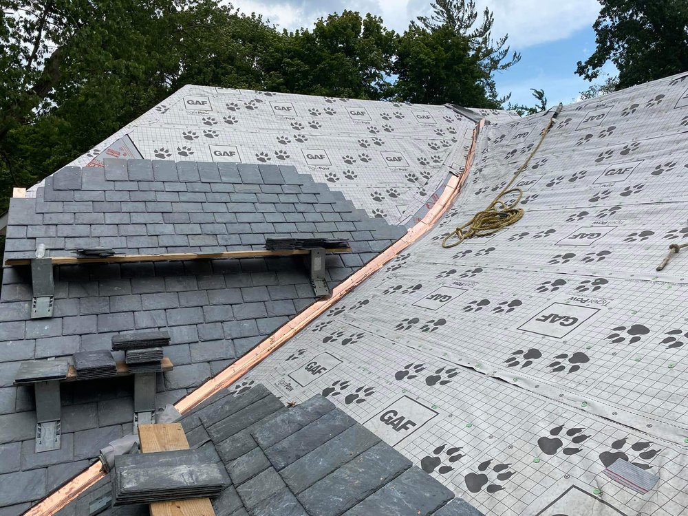 Slide of Sagan Commercial Roofing