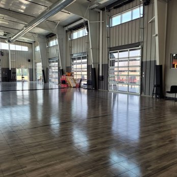 Oakstone Recreational - a large open space with wood floors - American Near Me - Cottage Grove, Wisconsin