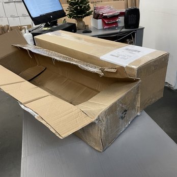 The Box Stop - My box I came in with that was falling apart and the better one they helped me repack my shipment in. - Packing Supplies Near Me - Reseda, California
