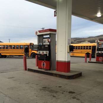 Chevron - a gas station with school buses parked in the background - Gas Stations Near Me - Bridgeport, Washington Chevron - a gas station with school buses parked in the background - Gas Stations Near Me - Bridgeport, Washington