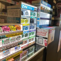 Red Star Vapor & Smoke - Interior - Nicotine pouch selection featuring Rogue, Zyn, and Red Star Pouches