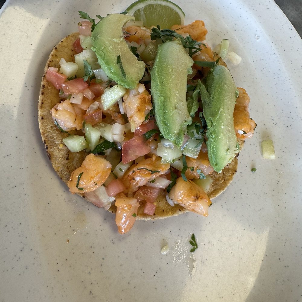Shrimp ceviche on tostada shell Shrimp ceviche on tostada shell