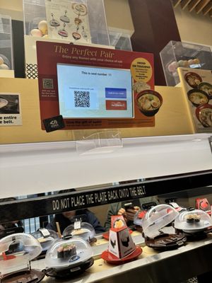 Kura Revolving Sushi Bar by null