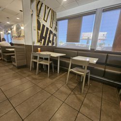 McDonald's - Cups left on table, dirty floors