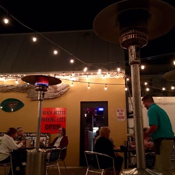 The Magic Oyster - Outside seating on a beautiful night - Seafood Near Me - Jensen Beach, Florida The Magic Oyster - Outside seating on a beautiful night - Seafood Near Me - Jensen Beach, Florida