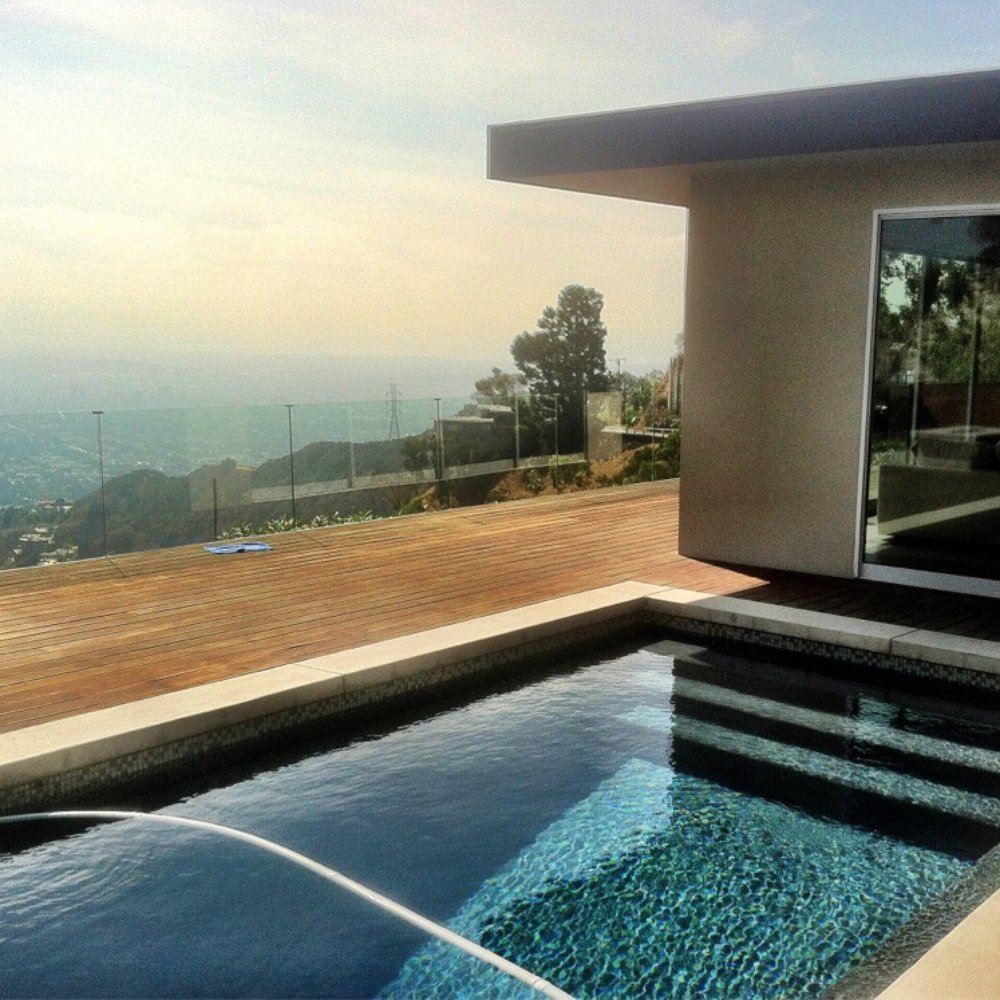 Spider Window Cleaning - Sliding glass doors & deck glass surrounding patio - Window Washing Near Me