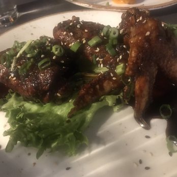 Hide - Twice Fried Wings with the sticky Thai sauce - Cocktail Bars Near Me - Dallas, Texas