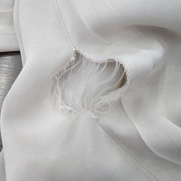 Brand new white pants brought to cleaners, damage has been done Brand new white pants brought to cleaners, damage has been done