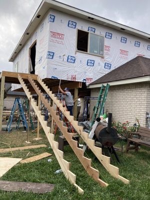 Adan’s Roofing & Construction Logo