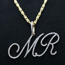 Custom diamond name pendants.