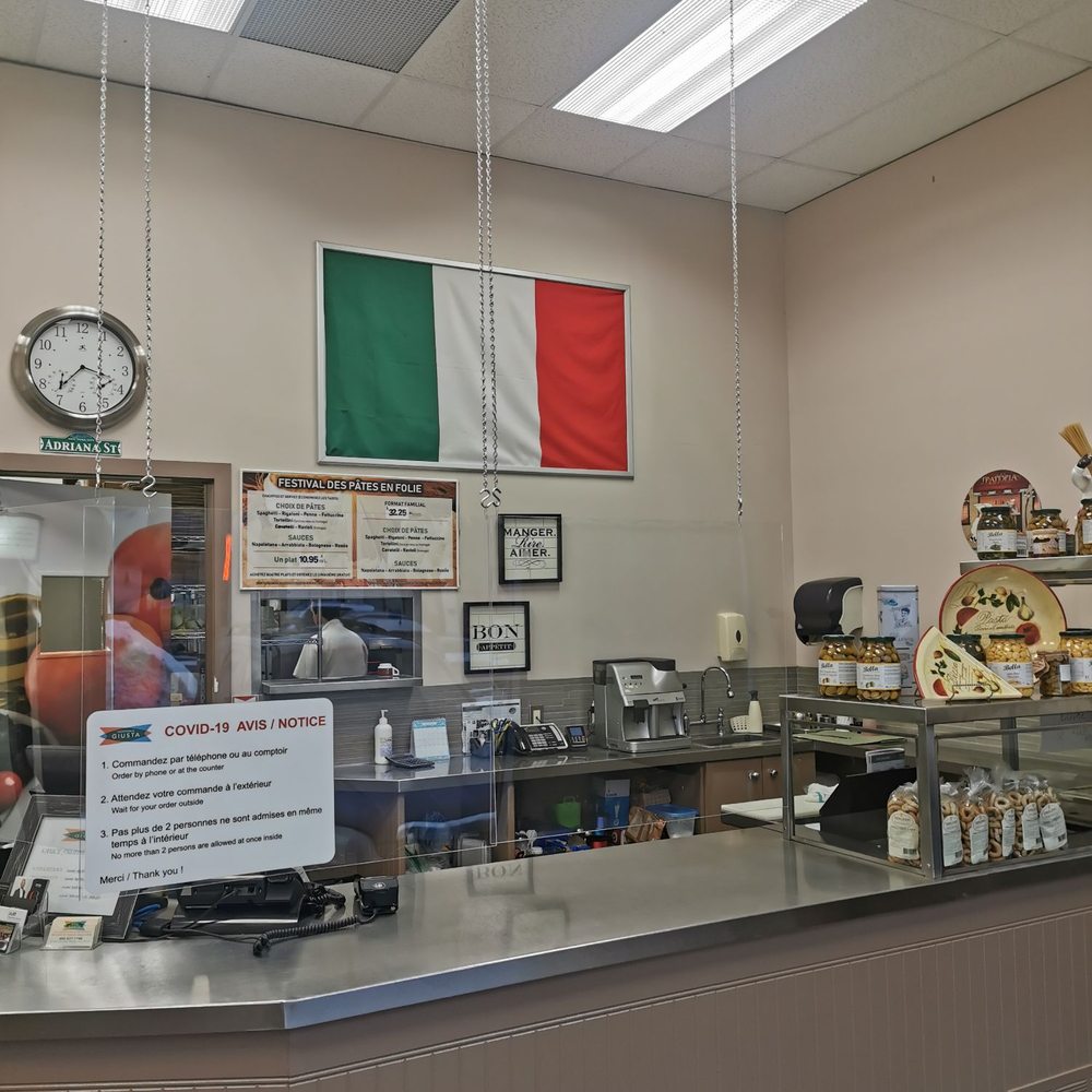Pizzeria Trattoria Giusta - the interior of a restaurant - Italian Near Me - Laval, Quebec Pizzeria Trattoria Giusta - the interior of a restaurant - Italian Near Me - Laval, Quebec
