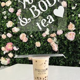 Signature Milk Tea with boba and coconut jelly.