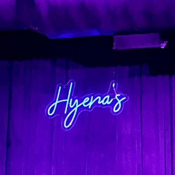 Hyena's Comedy Nightclub - a man on stage - Comedy Clubs Near Me - Dallas, Texas Hyena's Comedy Nightclub - a man on stage - Comedy Clubs Near Me - Dallas, Texas