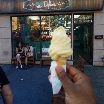 La Diperie - a person eating an ice cream cone - Ice Cream & Frozen Yogurt Near Me - Montreal, Quebec La Diperie - a person eating an ice cream cone - Ice Cream & Frozen Yogurt Near Me - Montreal, Quebec
