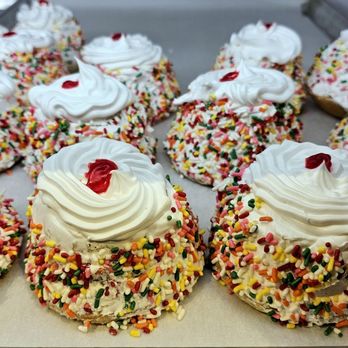 Compare Foods - a tray of cupcakes with white frosting and sprinkles - Grocery Near Me - Charlotte, North Carolina Compare Foods - a tray of cupcakes with white frosting and sprinkles - Grocery Near Me - Charlotte, North Carolina