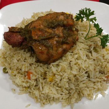 Mimi's Peruvian Cuisine - Arroz con pollo (one small piece of chicken and A LOT of rice) - Peruvian Near Me - Honolulu, Hawaii Mimi's Peruvian Cuisine - Arroz con pollo (one small piece of chicken and A LOT of rice) - Peruvian Near Me - Honolulu, Hawaii