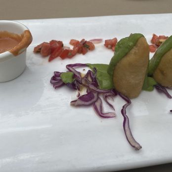 Rio Grill - Empanadas, with a tasty chipotle sauce, not spicy - American Near Me - Carmel-by-the-sea, California Rio Grill - Empanadas, with a tasty chipotle sauce, not spicy - American Near Me - Carmel-by-the-sea, California