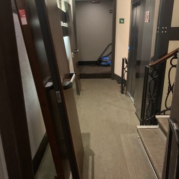 Rome Times Hotel - under construction. doors removed everywhere. vacuum in walkway. that is the main elevator - Hotels Near Me - Rome, RM Rome Times Hotel - under construction. doors removed everywhere. vacuum in walkway. that is the main elevator - Hotels Near Me - Rome, RM