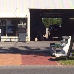 Ardrossan Bakery - A man and dog enter Ardrossan Motor Repairs across the road. Typical of the non-stop action in this important regional centre.