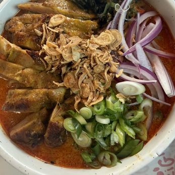 GiGi Curry & Noodle Bar - Massaman Peanut Curry with an egg noodle base topped off with Chicken Satay - Noodles Near Me - Brooklyn, New York GiGi Curry & Noodle Bar - Massaman Peanut Curry with an egg noodle base topped off with Chicken Satay - Noodles Near Me - Brooklyn, New York