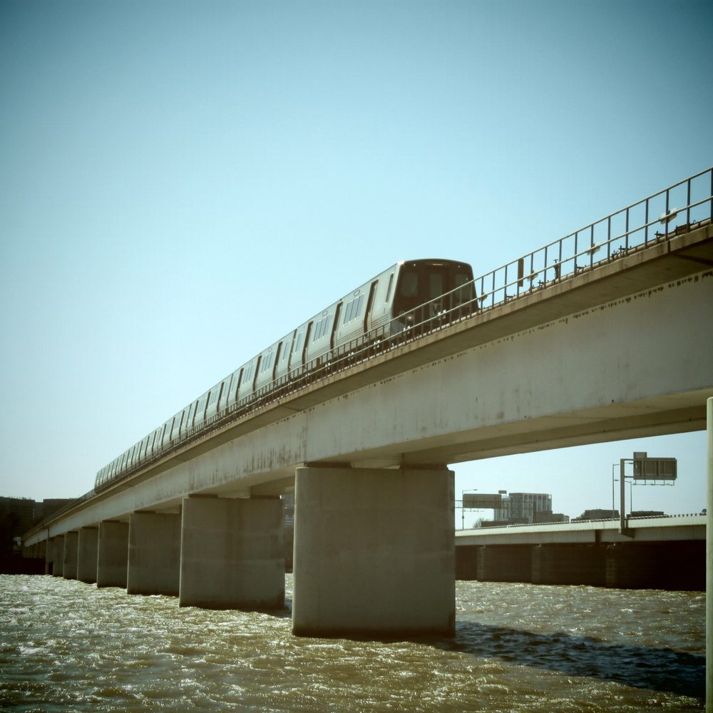 East Potomac Park - An Amtrak train crosses the Potomac River parallel to the 14th Street Bridge. - Parks Near Me - Washington, DC, District of Columbia East Potomac Park - An Amtrak train crosses the Potomac River parallel to the 14th Street Bridge. - Parks Near Me - Washington, DC, District of Columbia