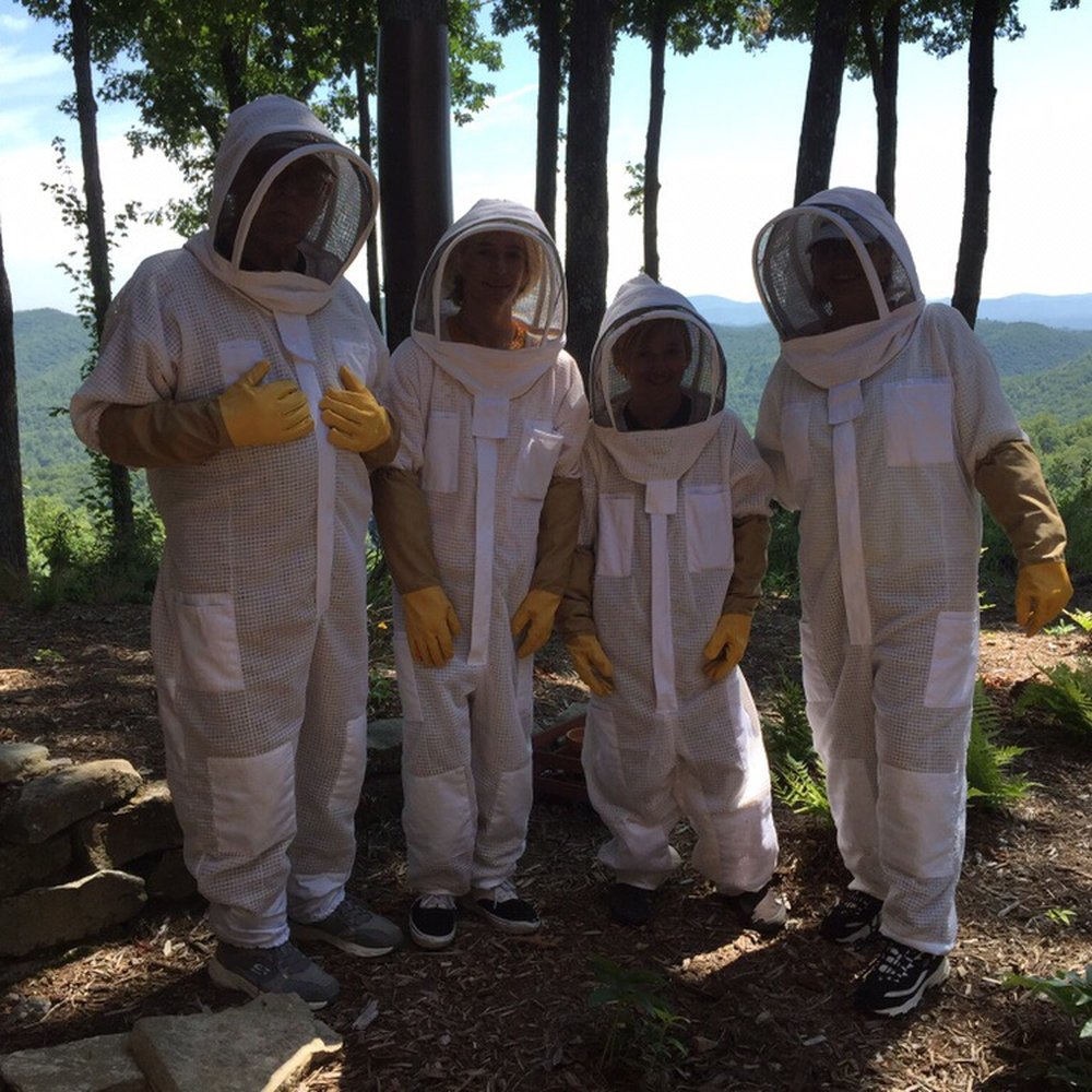 Killer Bees Honey - a group of beekeepers dressed in bee suits - Honey Near Me