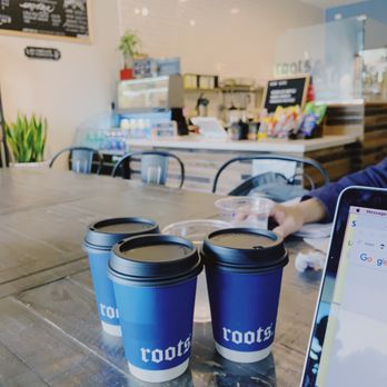 Roots Cafe - Large study table with a surge protector on the right - Cafes Near Me - Cerritos, California