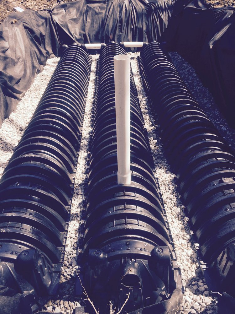 Slide of EmRay Excavating