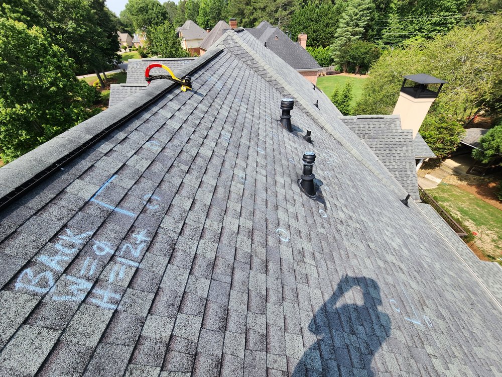 Slide of The Roofing Specialists