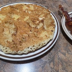 Seven Slot Grille - Pineapple pancakes no cherry and side of crispy bacon