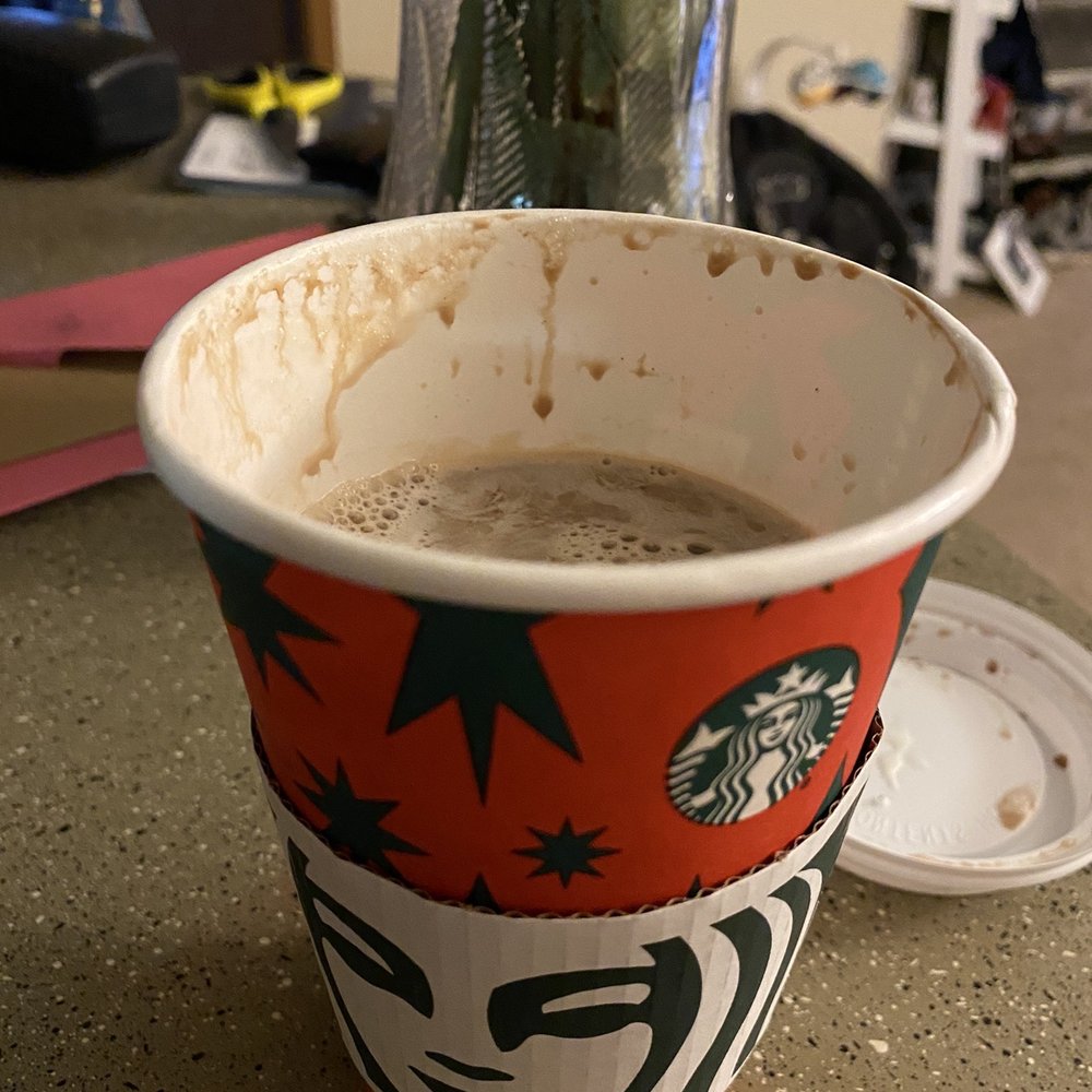 Starbucks - a cup of coffee on a table - Coffee & Tea Near Me - Omaha, Nebraska