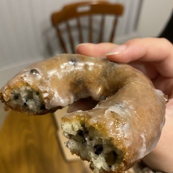 M & M Donuts - a hand holding a glazed donut - Donuts Near Me - Anaheim, California