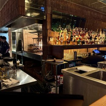 Ossobuco Miami- Steak house - Bar area with view of open fire - Steakhouses Near Me - Miami, Florida Ossobuco Miami- Steak house - Bar area with view of open fire - Steakhouses Near Me - Miami, Florida