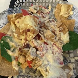 Nachos were delicious. Already dug in but flavor is great! Get them!