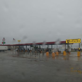 Pilot Travel Center - a view of a gas station in the rain - Gas Stations Near Me - Oak Grove, Kentucky