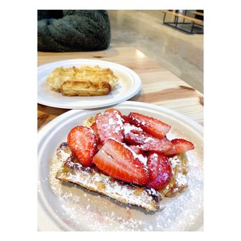 Press Waffle - Plain Liege Waffle & Liege Waffle with strawberries topping and powdered sugar - Waffles Near Me - St. Louis, Missouri