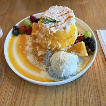 Escape 360 - Thai Siam mango soufflé, star of the show was the coconut stick rice. $20 - Cafes Near Me - McKinney, Texas